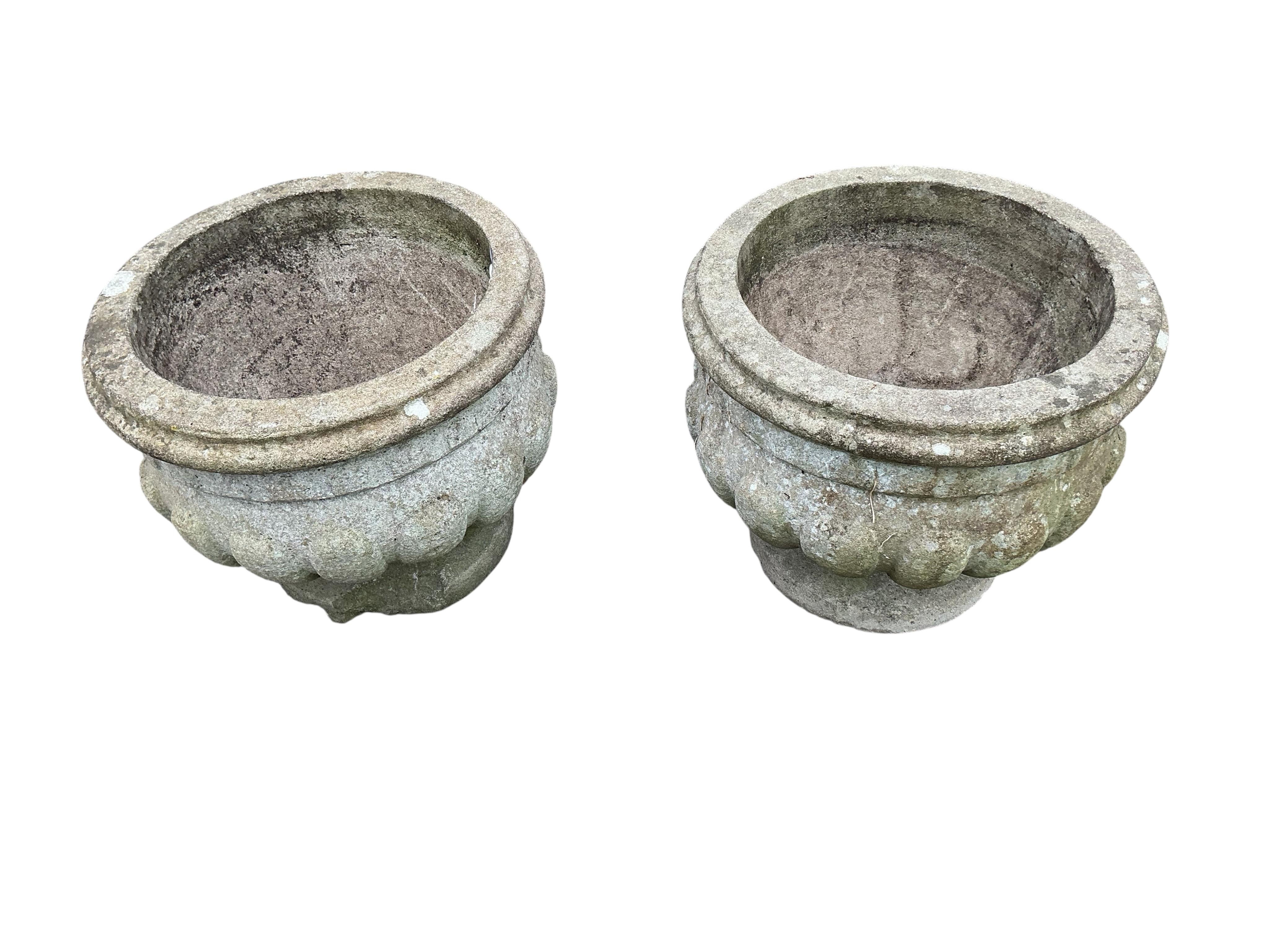 A pair of circular reconstituted stone garden planters, diameter 50cm, height 41cm